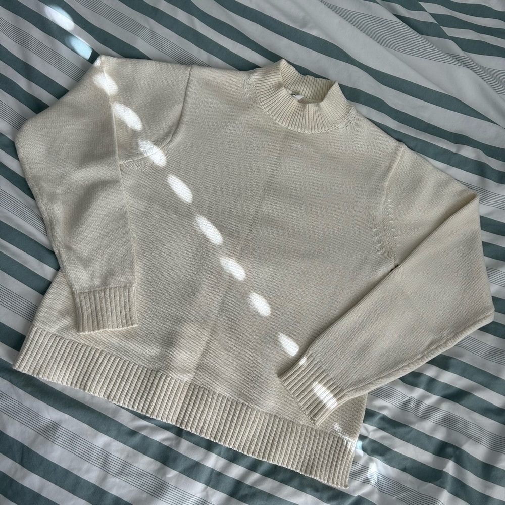 Uniqlo off white mock neck sweater with split hem